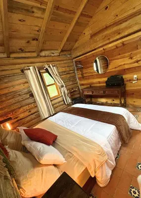 Cama o camas de una habitación en Cabaña Flor de Agave