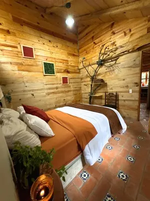 Cama o camas de una habitación en Cabaña Flor de Agave