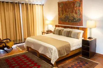 Cama o camas de una habitación en Hotel Casa Corazón Malinalco