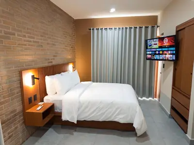 Cama o camas de una habitación en Kooch Aparthotel