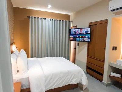 Cama o camas de una habitación en Kooch Aparthotel