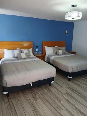 Cama o camas de una habitación en Hotel Casa Solariega
