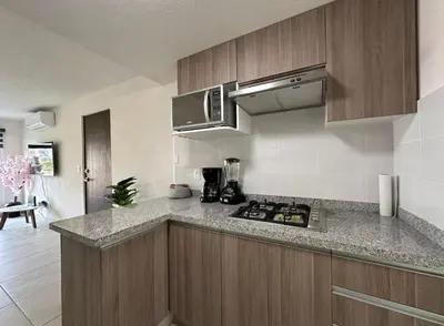 Una cocina o zona de cocina en Depa MAJUM Aries