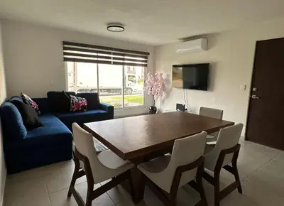 Una televisión o centro de entretenimiento en Depa MAJUM Aries
