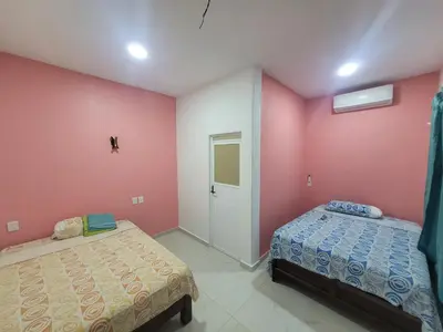 Cama o camas de una habitación en Lirio Acuático