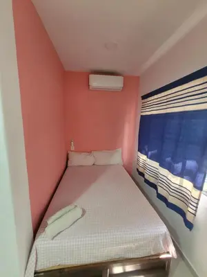 Cama o camas de una habitación en Lirio Acuático