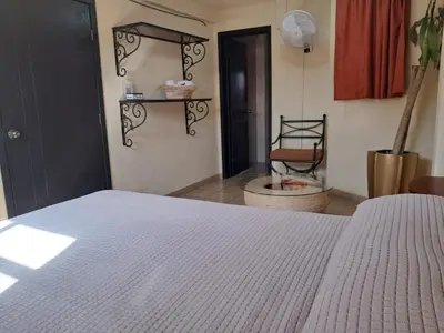 Cama o camas de una habitación en Hotel Antigua Encomienda