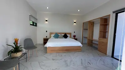 Cama o camas de una habitación en Chalchitepetl hab en Casa Carolina