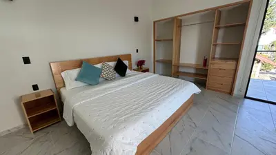 Cama o camas de una habitación en Chalchitepetl hab en Casa Carolina