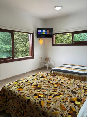Cama o camas de una habitación en Hotel Monkey House Tuxtla Gutiérrez