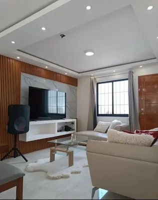 Una televisión o centro de entretenimiento en Cabañas el Rincon de los Sueños