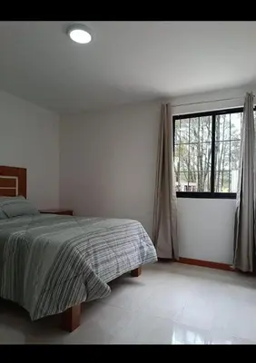 Cama o camas de una habitación en Cabañas el Rincon de los Sueños