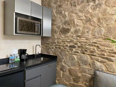 Una cocina o zona de cocina en Rafaello Loft in Val'Quirico