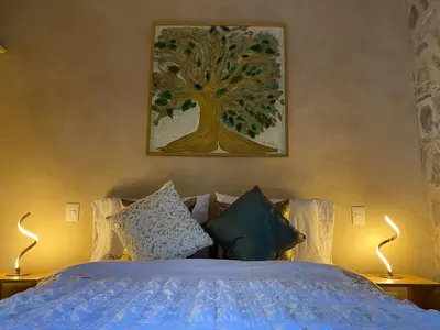 Cama o camas de una habitación en Rafaello Loft in Val'Quirico