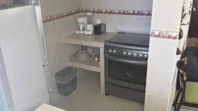 Una cocina o zona de cocina en Villa Guitarron gran terraza vista espectacular 6 huespedes piscina gigante