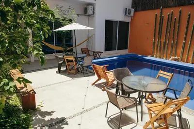 Un patio o zona al aire libre en CASA GUAJE 5min to Beach Bacocho and Coral 3Floor House 6 Bedrooms all with AC 8 beds up to 16 Guests Wifi starlink