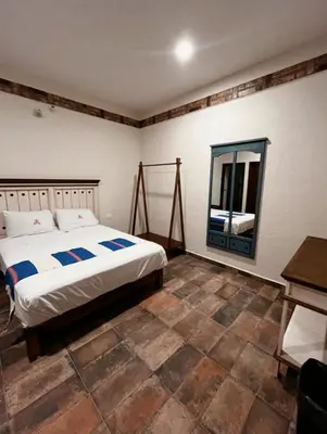 Cama o camas de una habitación en Hotel Finca San José