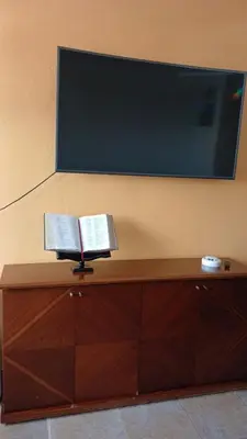 Una televisión o centro de entretenimiento en Pinotepa Nacional- Small Apartment