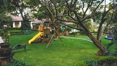Zona de juegos infantil en Malinalco Country House with Pool and Paddle Court