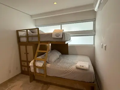 Cama o camas de una habitación en Departamento para 12 personas con vista al mar