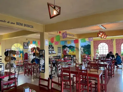Un restaurante o sitio para comer en Hotel Leilani