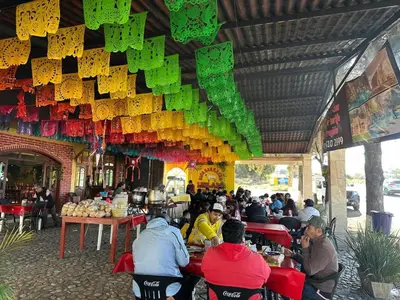 Un restaurante o sitio para comer en Hotel Leilani