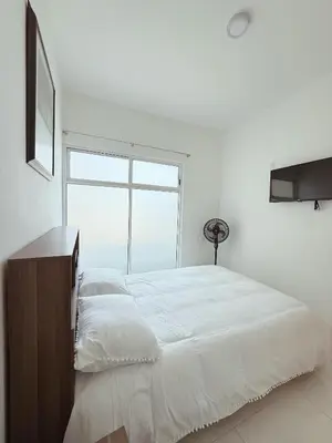 Cama o camas de una habitación en Brightly 2BR Apt in Oaxaca - Peaceful