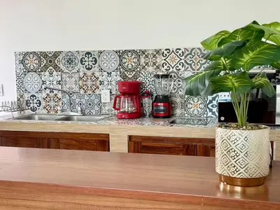 Una cocina o zona de cocina en Comfortable Apt near the Beach