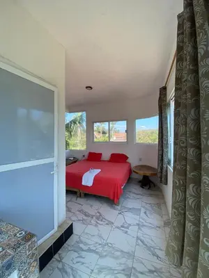 Cama o camas de una habitación en Fiesta Zipolite