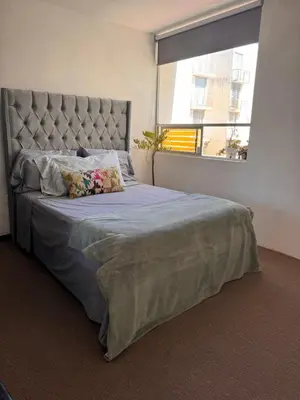 Cama o camas de una habitación en Cómodo departamento