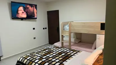 Cama o camas de una habitación en Habitación Chero Platinum