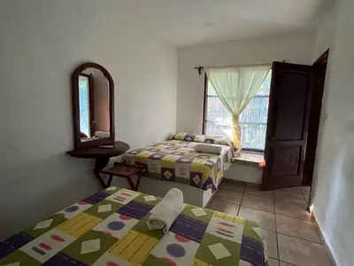 Cama o camas de una habitación en Hotel Cocoloco