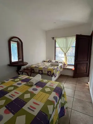 Cama o camas de una habitación en Hotel Cocoloco