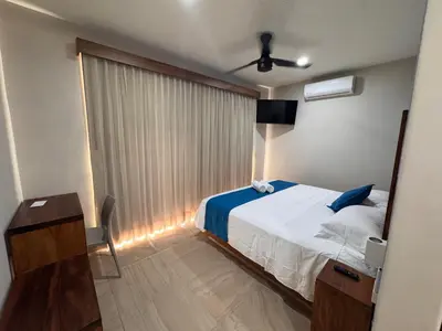Cama o camas de una habitación en Aeropuerto Express Huatulco