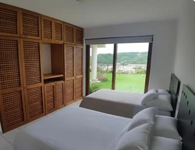 Cama o camas de una habitación en Departamento Cruz de Mar