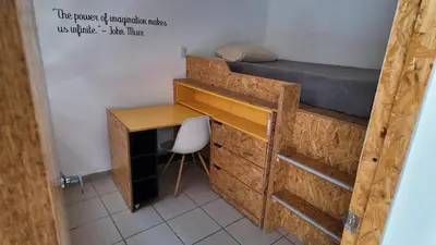 Cama o camas de una habitación en Living Up