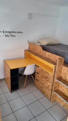Cama o camas de una habitación en Living Up