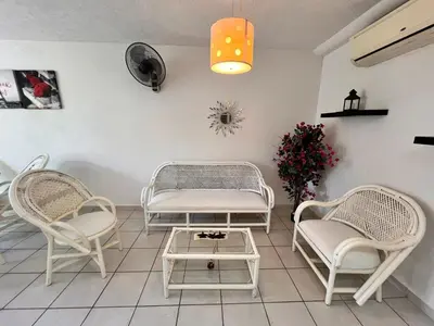 Zona de estar de Departamento planta baja en la laguna