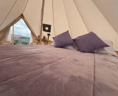 Cama o camas de una habitación en Glamping Rincón de Lavanda