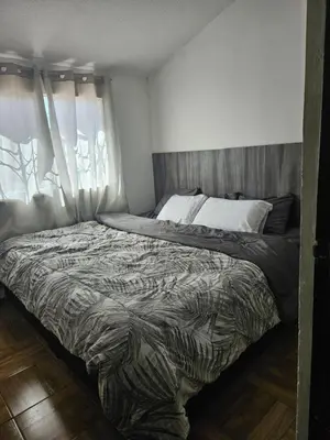Cama o camas de una habitación en Departamento entero Cerca de estrella de Puebla y Cholula