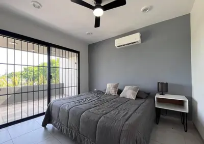 Cama o camas de una habitación en Casa villas del invernadero