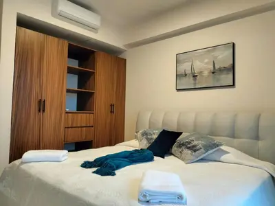 Cama o camas de una habitación en Luxury 2-Bedroom Apartment with amazing view - Infinity Pool and Rooftop in Building