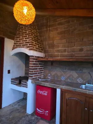 Una cocina o zona de cocina en Cabaña el rio la tranquilidad