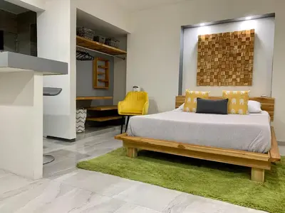 Cama o camas de una habitación en Acogedora suite con entrada independiente