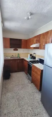 Una cocina o zona de cocina en Amplio apartamento, Excelente ubicación 3 habitaciones 5 camas