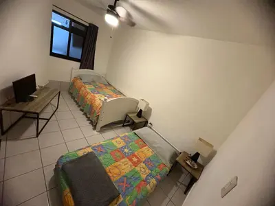 Cama o camas de una habitación en Departamento céntrico puerta calle con 47 amenidades