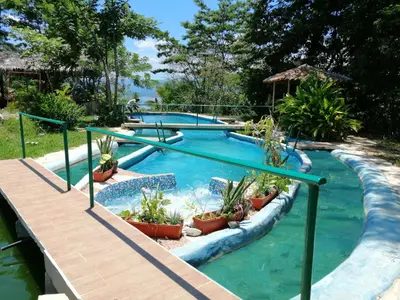 Piscina en o cerca de Ecolodge Rancho del Lago