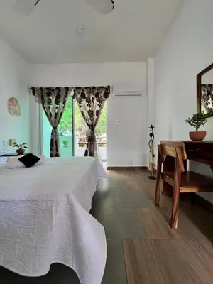 Cama o camas de una habitación en Hotel Real Juquilita - Starlink Internet