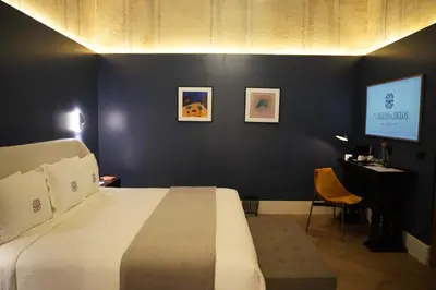 Cama o camas de una habitación en Por los Siglos de los Siglos Hotel