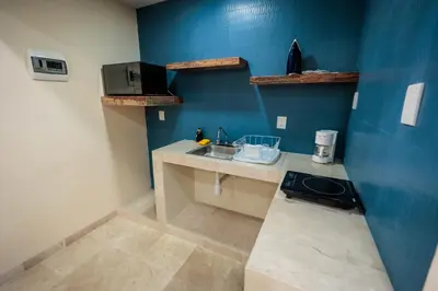 Una cocina o zona de cocina en Casa Margarito Jalatlaco